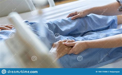 Elderly Senior Patient Ageing Old Adult Person Lying In Hospital Bed