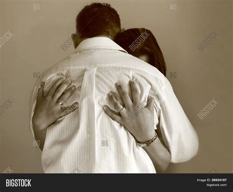 Sadness Woman In Mans Arms Stock Photo And Stock Images Bigstock
