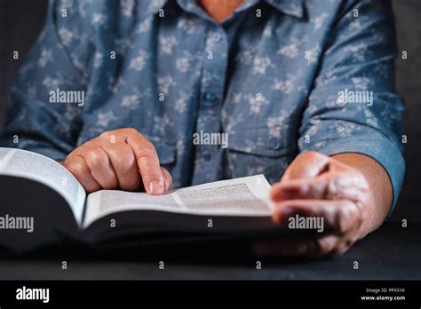 Old Woman Reading Thick Book At Home Grandmother With Bible