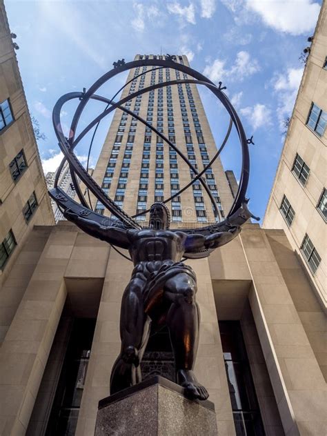 Atlas Statue By Lee Lawrie With Face Mask In Front Of Rockefeller