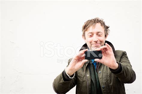 Man Taking Picture With Mobile Phone Stock Photo Royalty Free