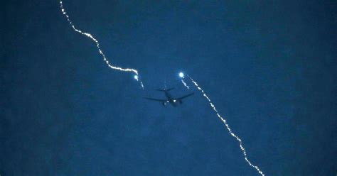 Lightning Strikes Plane Near Heathrow As Sky Flashes Blood Red In