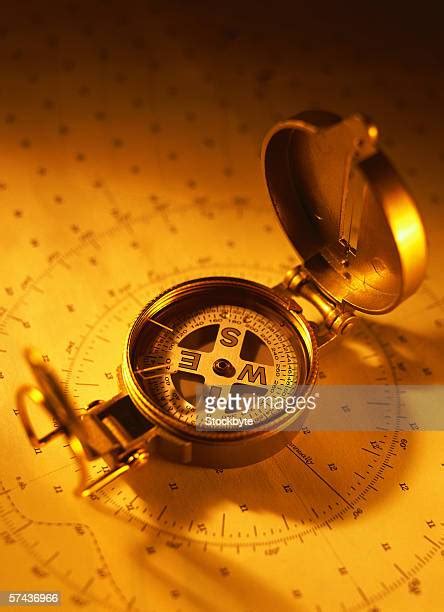 Gold Compass Photos And Premium High Res Pictures Getty Images