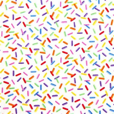 White Designer Fabric With Funny Colourful Sprinkles Fabric Design