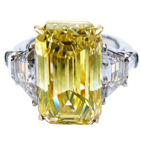 825 Carat Gia Certified Natural Fancy Yellow Emerald Cut Diamond Ring