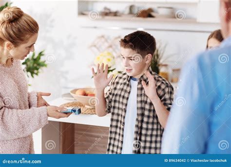 Serious Mother Scolding Her Son Stock Photo Image Of Relatives