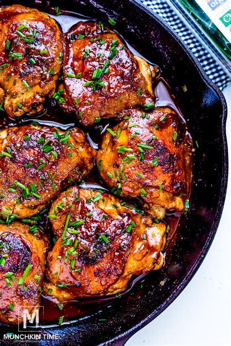 Line a large baking tray or half sheet pan with foil and place all the chicken pieces on it, skin side down. BBQ Baked Chicken Thighs Recipe - Munchkin Time