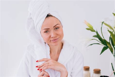 Free Photo Blonde Girl Posing In The Bathroom With Bath Robe