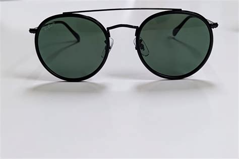 ray ban sunglasses polarised black round double bridge rb3647 002 58 dark lenses 8053672737677