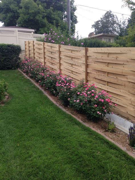 Renovate your wooden fence with renovator fence stain, the fastest way to stain your fence! Custom Wood Fence - American Fence Company Lincoln, NE