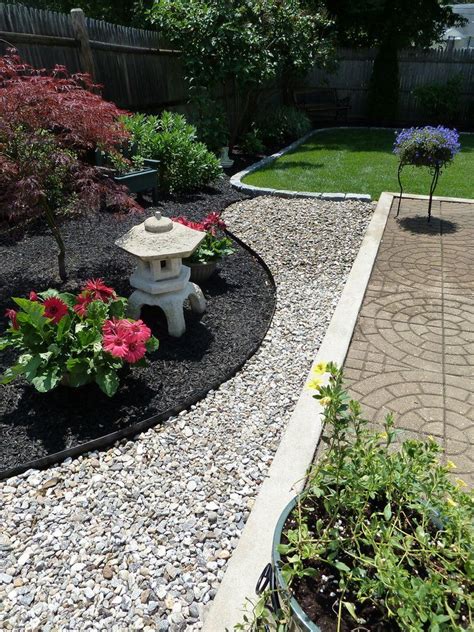 It features a japanese lantern made of rock with a few japanese garden plants. Pin by sultan khan on House and Yard inspirations | Small ...