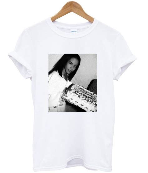 The legendary songstress aaliyah was born in 1979 and made her singing debut at the age of ten, thanks to the tv series star search. Aaliyah Graphic Tee