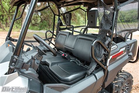 When you are not using the quickflip seat they fold flat, so you get the maximum utility when it comes to transporting. HONDA PIONEER 700-4 DELUXE TEST | Dirt Wheels Magazine