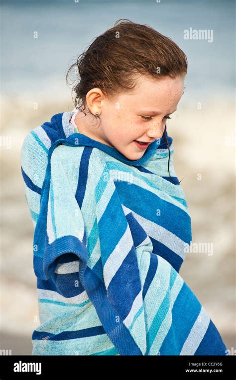 Cute Young Girl Drying Off With A Beach Towel Cape Cod Ma Stock Photo