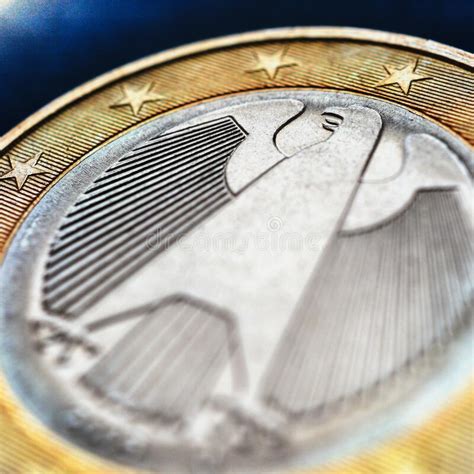 1 Euro Lies On Dark Blue Surface The Coin Was Issued In Germany