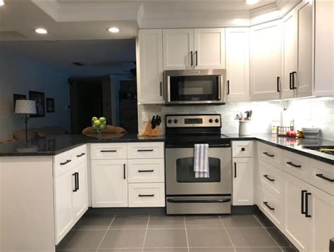 Mar 28, 2021 · black and white is a classic combination since the beginning of time. Modern White Kitchen Cabinets With Black Handles ...