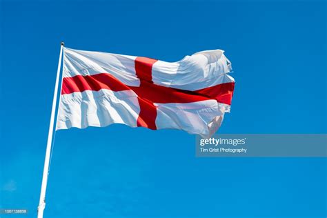 St George Cross Flag Of England Against A Blue Sky High Res Stock Photo