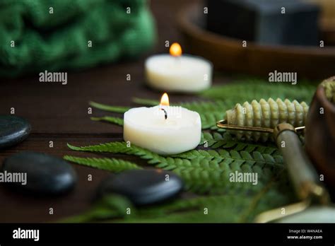 spa still life setting with candles massage stones and copy space spa and wellness background