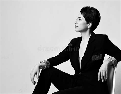 Young Beautiful Short Haired Brunette Woman In Elegant Business Suit