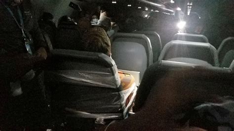 frontier airlines passenger taped to seat arrested after altercation
