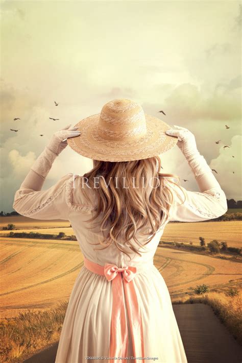 Trevillion Images Victoria Davies HISTORICAL WOMAN WEARING HAT IN COUNTRYSIDE PE