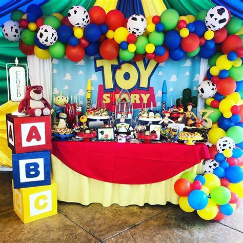 A Toy Story Themed Birthday Party With Balloons