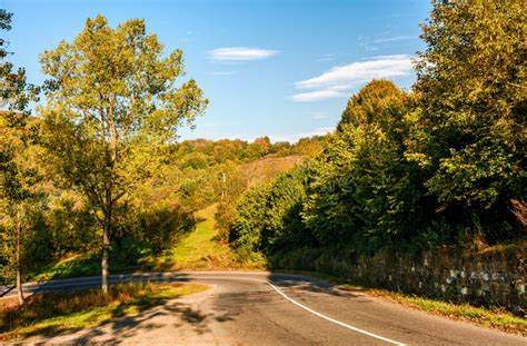 Trees By The Road In Autumn Mountainous Countryside Stock Image Image