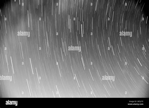 Abstract Long Exposure Of Star Trails In Night Sky Stock Photo Alamy