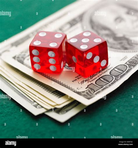 Still Life Of Pair Of Dice And Money Stock Photo Alamy