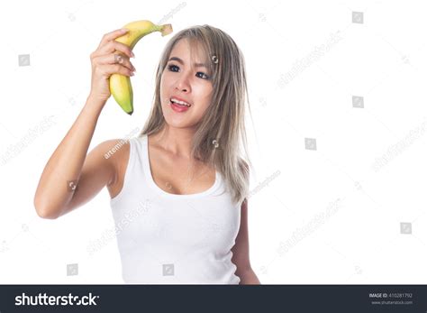 Sexy Asian Woman Holding Banana Her Stock Photo Shutterstock