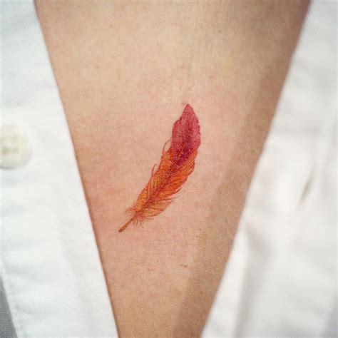 Red Feather Tattoo Feather Tattoo Design Feather Tattoo Tattoos
