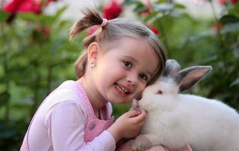 Free Photo Girl Holding White Rabbit During Daytime Adorable Happy Woman Free Download