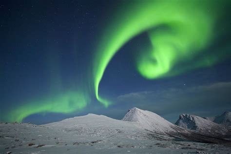 Mountain Top Aurora Aurora Borealis Over Mountains Near Tromsø In The