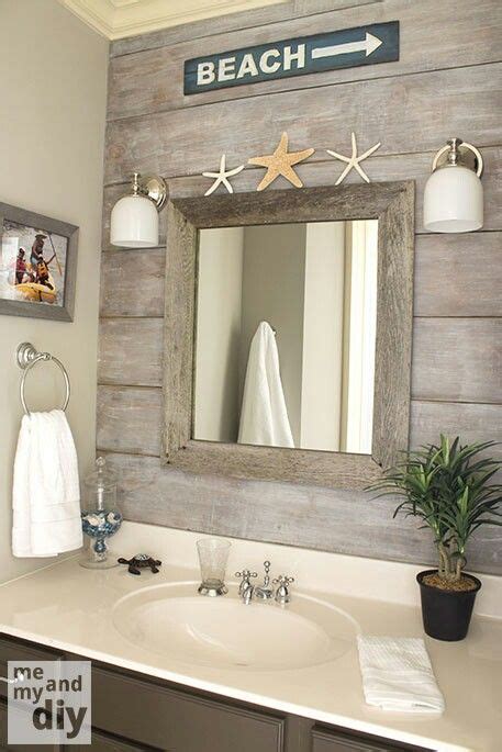 Beach inspired bathrooms are always elegant and entertaining. Weathered Look Wood Paneled Wall | Beach theme bathroom ...