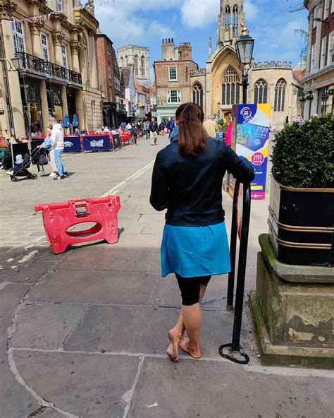 me standing barefoot in a busy city centre. I'm always happy to walk