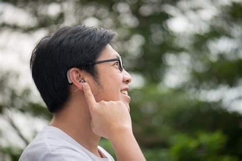 A Guide To Wearing A Hearing Aid With Glasses Hearing Expert