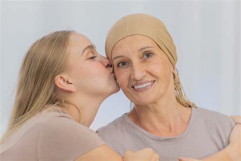 A Young And Beautiful Daughter Kiss Her Mother Cancer Patient And