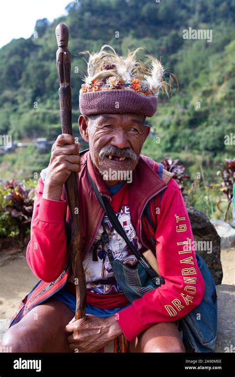 An Igorot Man Poses For A Photograph On The Tourist Trail Near To The