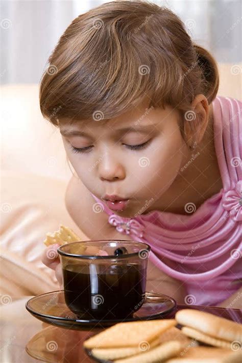 girl blow to hot tea stock image image of food caucasian 8263799
