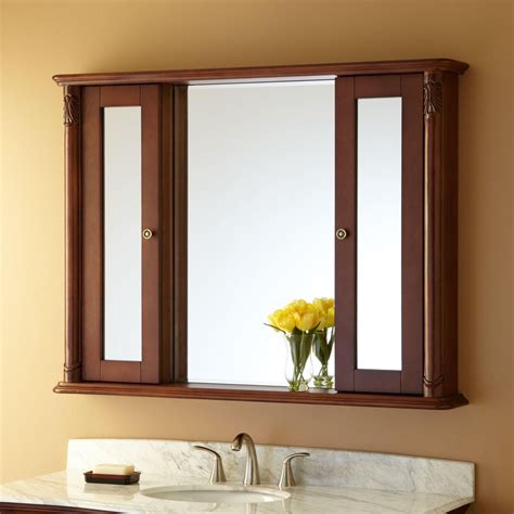 Besides housing the obligatory mirror for endless hours of primping and medications, and ugly first aid products) well out of sight. 48" Sedwick Medicine Cabinet - Bathroom