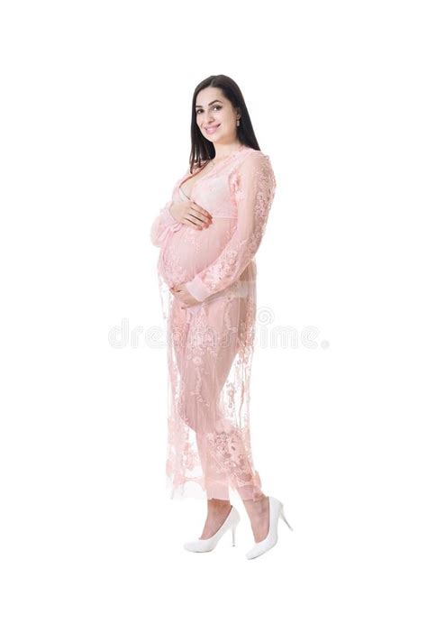 Portrait De La Belle Femme Enceinte Assis Sur Le Fauteuil Image Stock