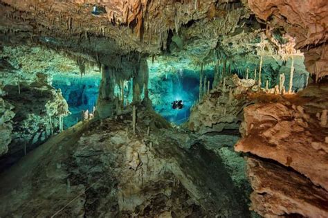 Cave Diver Exploring The Cenote System Dos Pisos In Yucatan Mexico