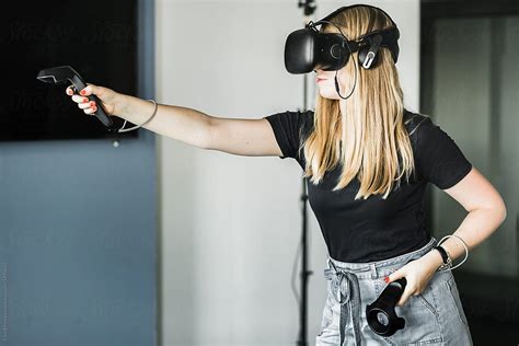 Blond Girl Playing Vr Game By Irina Efremova