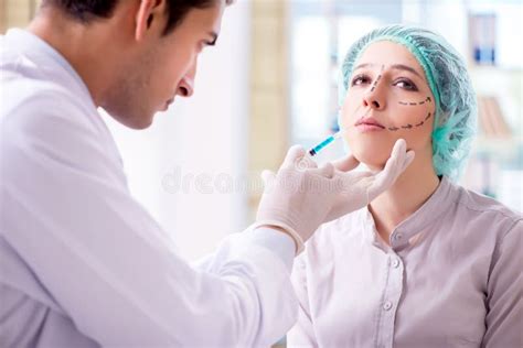The Plastic Surgeon Preparing For Operation On Woman Face Stock Image