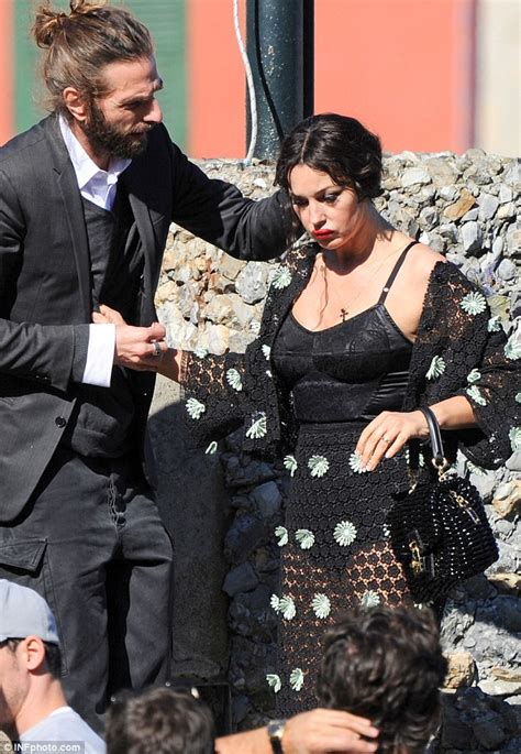 Monica Bellucci Flashes Her Cleavage As She Shoots New Dolce And Gabbana