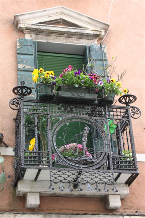 Fakro balcony windows are an innovative, large roof window that opens into a balcony. Free Images : house, window, balcony, metal, italy, facade ...