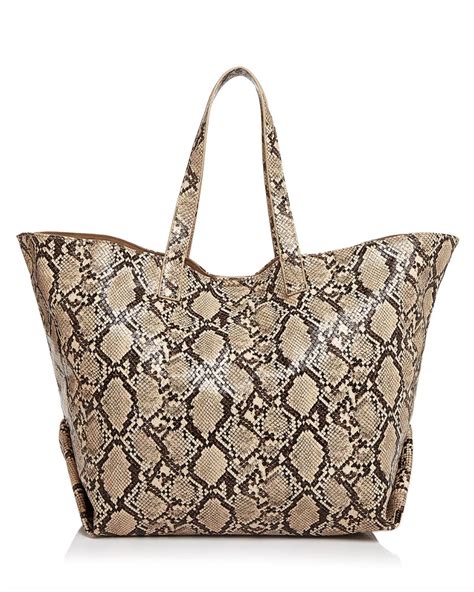 Snakeskin Is Here To Stay And Were Sharing Our Favorite Snakeskin Bags