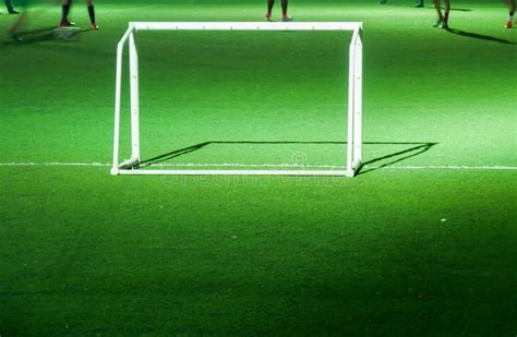 Football Or Soccer Field With The Goal Post In The Night Time Stock
