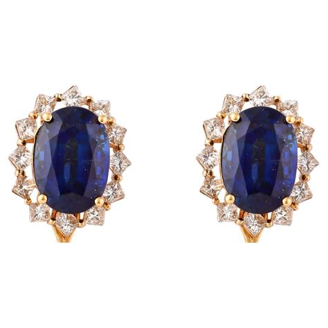 Blue Sapphire And Emerald Stud Earrings With Diamond In 18 Karat White