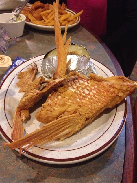 Pat the fish dry and cut 3 small slits on each side of the fish. Fried snapper throats! - Yelp